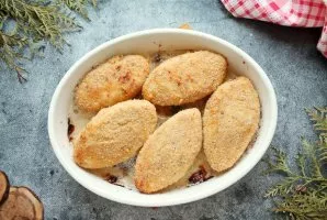 Place the tin with cutlets in a hot oven and bake at a temperature of 200 degrees for 10 minutes. Carefully turn over and bake for anothe...