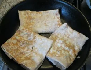 Heat a dry pan and place the lavash patty. Fry on medium heat until golden on both sides. That's it, delicious and simple lavash with che...