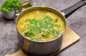 If desired, add chopped herbs to the soup. Remove the bay leaf. Mash the soup with a blender and serve.
