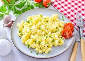 Put the prepared pasta on a plate and serve. Enjoy your meal!