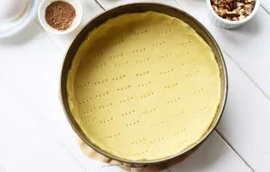 Line the baking sheet with baking paper. Roll out the dough with a rolling pin in the form of a circle, in proportion to the size of the ...