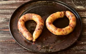 Send it to the oven heated to 190 degrees for 35-40 minutes. To prevent the sausage from bursting, pierce it in several places with a nee...