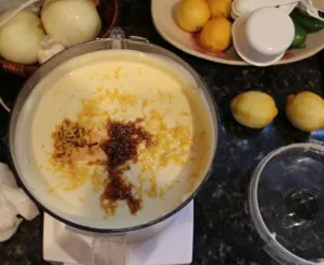 Add the grated zest of two lemons and vanilla essences to the curd mass.