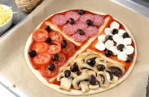 Sprinkle all the parts with olives. Sometimes pickled cucumbers are added instead of olives.