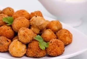 Serve hot with fresh herbs and vegetables. Delicious!