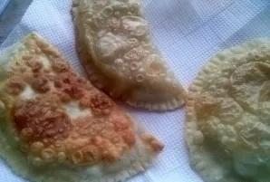 Fry in heated oil on medium heat from each side until golden brown. Place the finished dumplings on paper towels to remove excess oil.