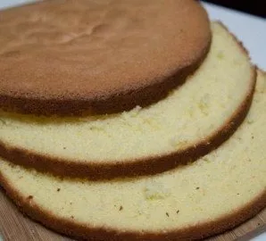 In another bowl, mix the remaining condensed milk and milk until smooth. Cut the biscuit into three equal parts.