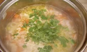 As soon as the potatoes are ready, add pieces of chicken to the soup, salt and add greens. I usually use chopped parsley. Delicious!