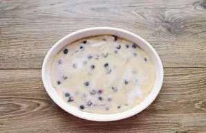 Lubricate the baking dish with vegetable oil and transfer the dough, flatten it. If you like a crispy crust on top, sprinkle the cake wit...