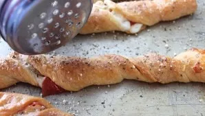 Sprinkle the prepared pastries with spices and serve with tomato sauce. Delicious!