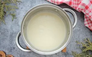Constantly stirring the soup pour the cream mixture. Salt everything, bring it to a boil and remove it from the fire. Pour the prepared V...