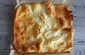 During baking, the pancake will swell, lumps will form, but as soon as it is taken out of the oven, all irregularities will be resolved. ...