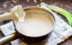 Crush the soup with a blender, boil for a minute and serve.