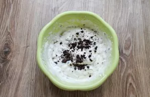 Mix gelatin gently with cream, add the reserved cookie crumbs and mix again.