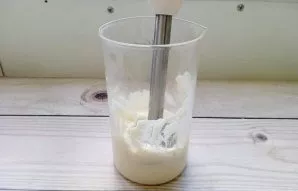 Immerse the blender in a container and start whipping the oil mixture. After a few seconds, the mayonnaise will begin to thicken and fill...