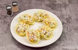 Spread the appetizer on chips. Serve the appetizer immediately.