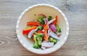 Season the vegetables with salt and pepper and mix.