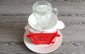 Cover the top with the hanging ends of cheesecloth, put a jar or cup full of water on top (to pressurize the cake) and put it in the refr...