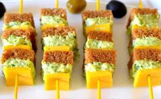 Everything is ready and you can collect a snack. Apply a small amount of sauce to a piece of bread and cover with cheese. If desired, rep...