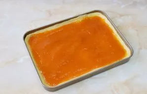 Spread any thick jam in an even layer. I used apricot jam.