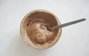 Add cocoa to the second half of the dough and mix.