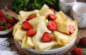 Serve the prepared pancakes with fruits, berries, jam or syrups. You can wrap any filling in them. Bon Appetit!