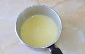 Remove the lemon zest and pour in the juice. Then add sugar and starch. Stir and put on the fire. While stirring, bring to a boil. The ma...