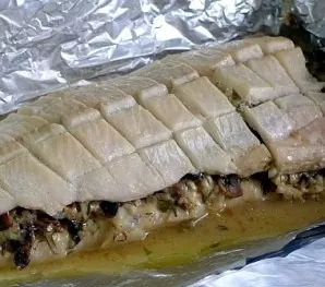 Bake for 30 minutes at a temperature of 200 degrees in foil, then open the foil and bake for another 10 minutes.