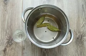 Pour vinegar into the boiling marinade and cook for another 2 minutes.