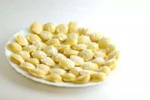 Turn the shape over and break it. Some dumplings will fall out on their own, some will need to put a finger on it. Put the culverts on a ...