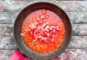 Add chopped tomatoes and simmer for 2-3 minutes.