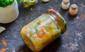 Lay out the soup in pre-sterilized jars, immediately roll up the lid and turn it upside down, wrap it with a blanket, and after a day tra...
