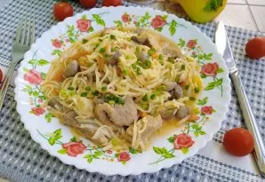 Mix the cooked pasta with meat and vegetables and transfer to a plate. Sweet and sour pasta with pork and vegetables ready. Delicious.