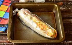 Put the fish in a baking dish with a glass of water.