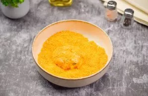 Form a small patty and roll in breadcrumbs.