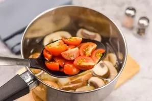 Immediately add cherry tomatoes to the soup.