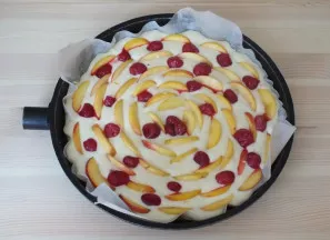 Add raspberries. If the berries have juice, strain the juice and place the berries on top of the dough. Place the cake in a hot oven for ...