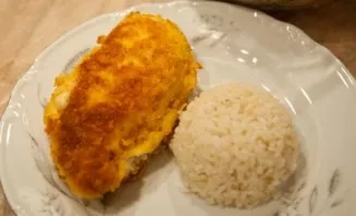 The dish is served with a side dish, most often boiled rice. Enjoy your meal!