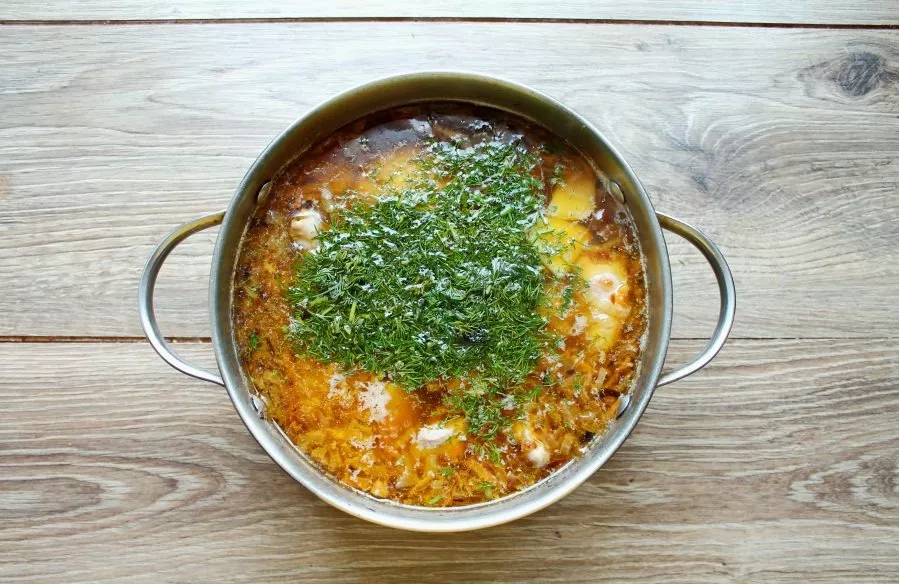 Chop the dill, add it to the soup pot, stir and serve.