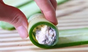 And we start spinning. One cucumber strip makes two rolls because we cut each strip in half. We roll the rolls tightly enough, and then p...
