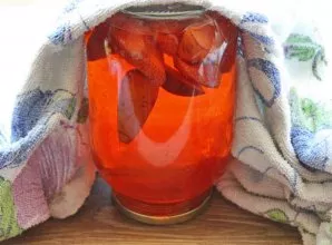 Turn the jar upside down and wrap it warmly until completely cooled.