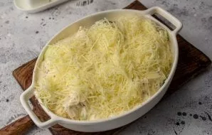 Sprinkle the remaining grated cheese on top. Put to bake in a preheated oven at 180 degrees for 30 minutes.