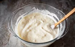 And stir gently until you get a homogeneous, fluffy dough.