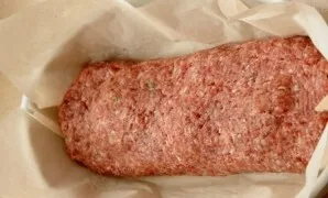 For frying rolls, it is better to take a long shape: rectangular or oval. Cut off baking paper and put a roll on it. Transfer the roll wi...