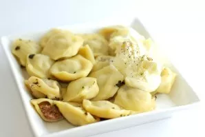 Cook homemade dumplings as usual. Serve with butter and sour cream. Delicious!