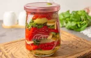 Immediately close tightly with a sterilized lid, turn upside down and leave to cool completely.