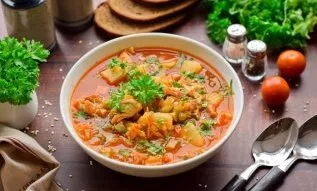 Soup with smoked sausage and barley is ready. Delicious!