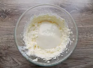 Pour in condensed milk and beat until fluffy.