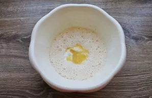 Pour the cooled butter into a bowl.