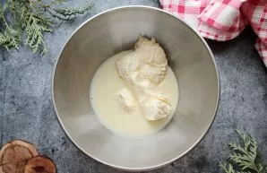 Mix soft butter and condensed milk. Beat until fluffy.